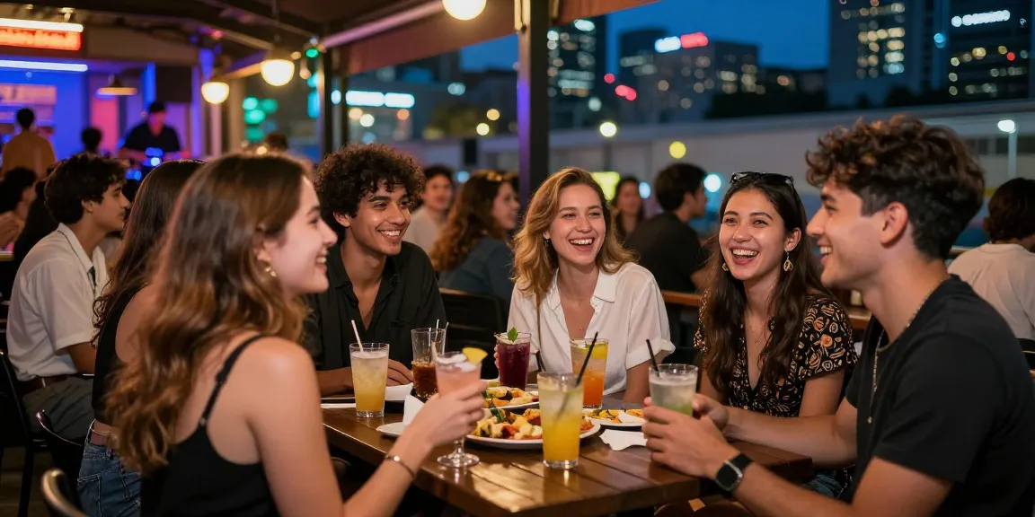 Exciting nightlife at a 유흥사이트 with friends enjoying cocktails and vibrant urban atmosphere